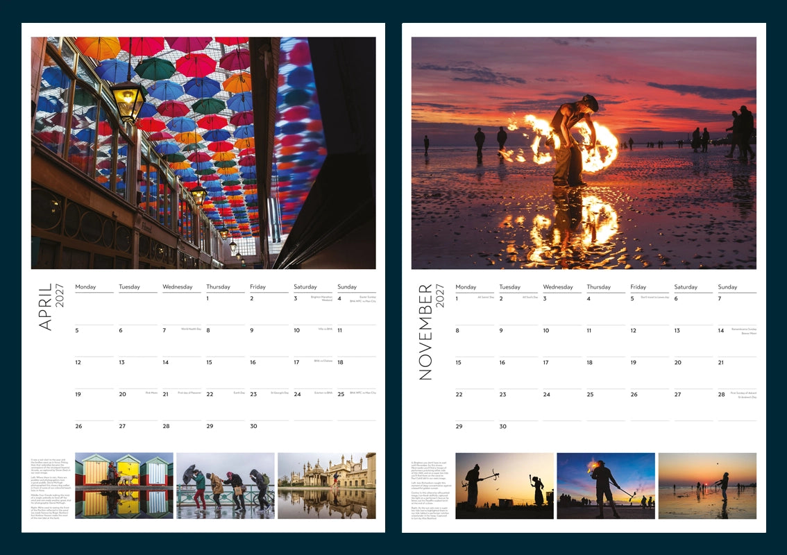 Two-page monthly calendar spreads showing April and November 2027. Each page features a large scenic photograph at the top: the left page shows a covered walkway with colourful hanging umbrellas, and the right page shows a beach scene at sunset with a person dancing on the beach with fire.